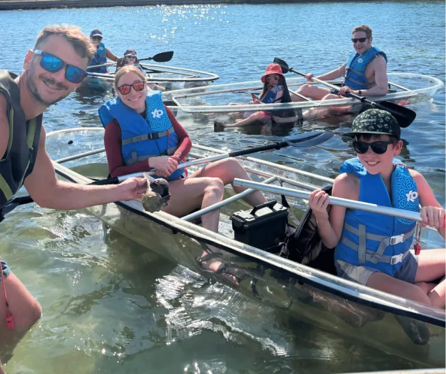 Clear kayak eco tour in action