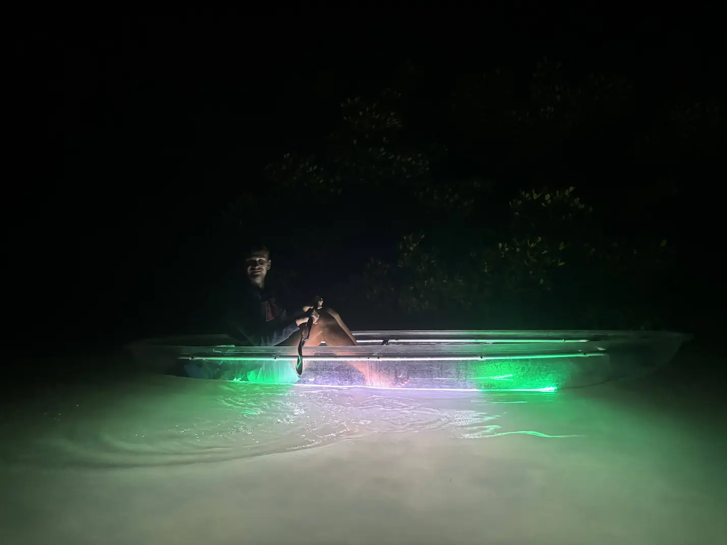 LED lights underwater view from clear kayak Sarasota