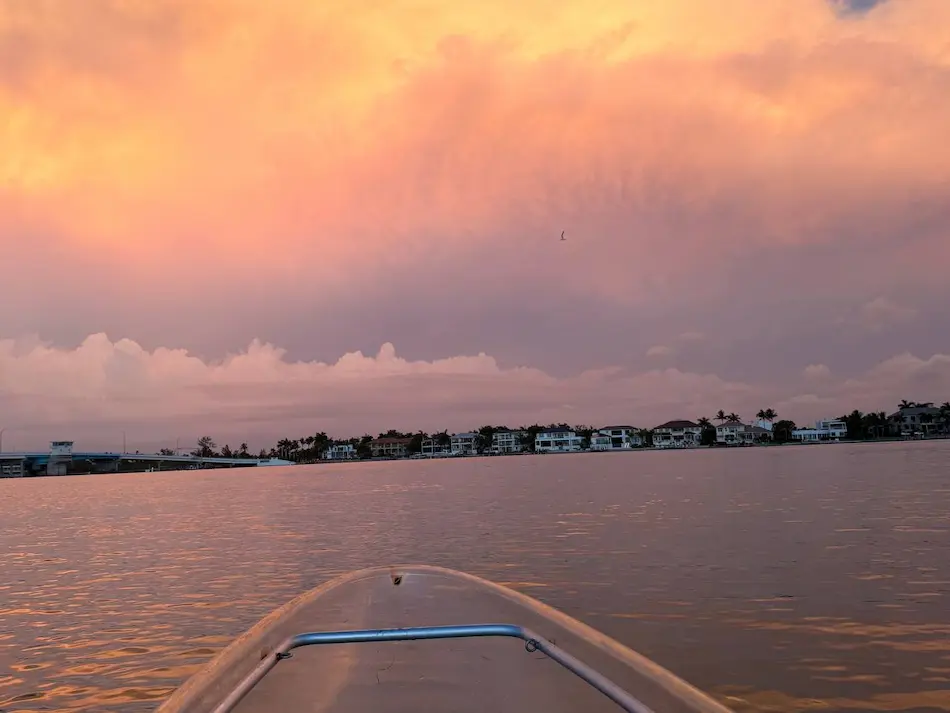 Golden hour reflection on the water during a Longboat Key clear kayak sunset tour
