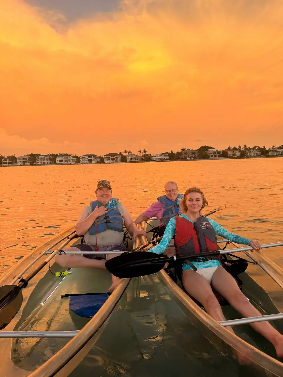 Golden hour light over the calm lagoon during a Longboat Key sunset kayak tour